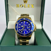 Rolex Submariner Gold Blue Bezel Openback Dial 40mm