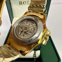 Rolex Submariner Gold Blue Bezel Openback Dial 40mm